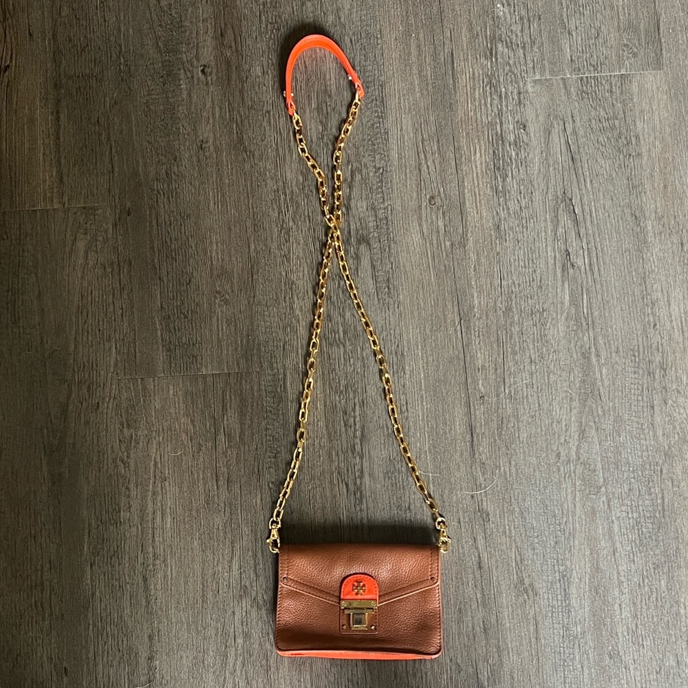 Tory Burch camel and orange cross body purse
